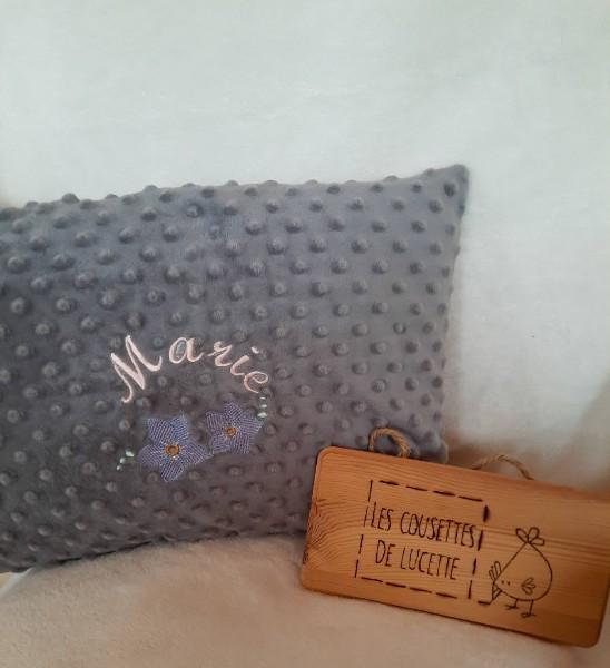 Broderie sur-mesure sur un coussin